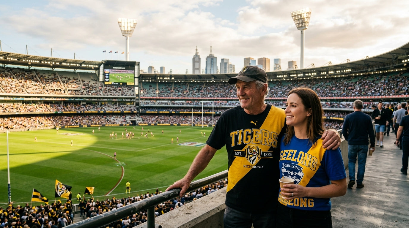 Two Australians in AFL graphic tees standing in the MCG outer, reflecting on Grand Final history