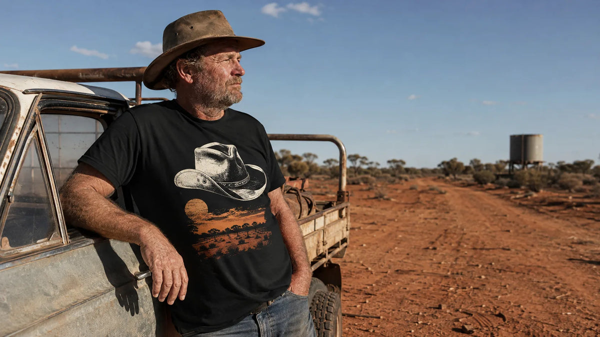 The Bush graphic tee worn beside an outback ute