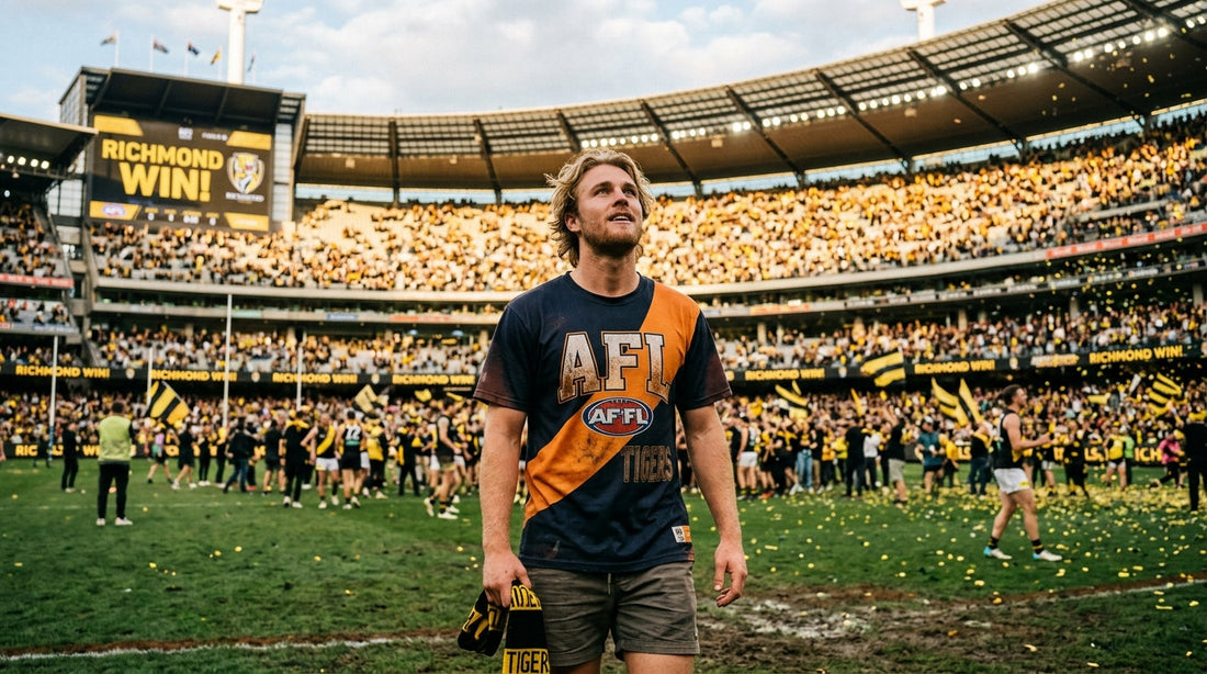 Australian man in AFL graphic tee at the MCG after the Grand Final, marking the Norm Smith Medal moment