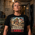 KISS ARSE 2 black tee on woman in bunker setting