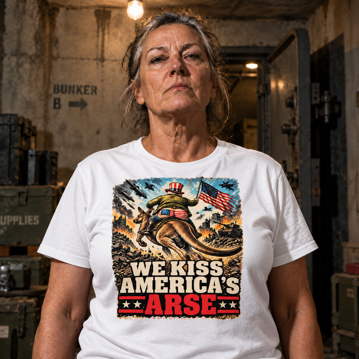 KISS ARSE 2 white tee on woman in bunker setting, square custom product image