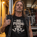 NO FUNDS NO TILT graphic tee on a rock musician at a Brisbane loading dock
